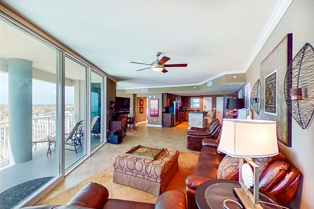 Stunning corner-condo with panoramic views, wraparound deck & beach access