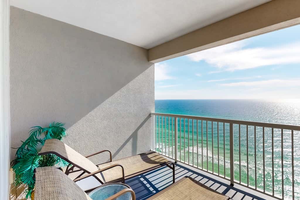 Gulf-facing condo with pool, scenic balcony, beach service & beach access
