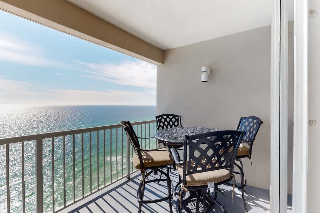 Gulf-facing condo with pool, scenic balcony, beach service & beach access