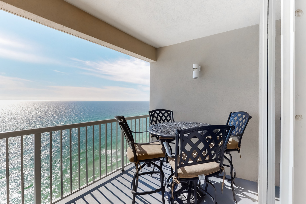 Gulf-facing condo with pool, scenic balcony, beach service & beach access