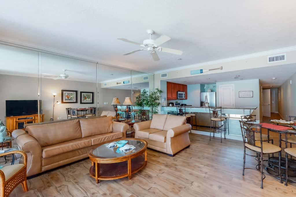 Gulf-facing condo with pool, scenic balcony, beach service & beach access