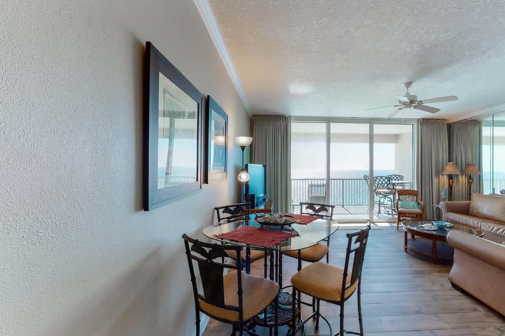 Gulf-facing condo with pool, scenic balcony, beach service & beach access