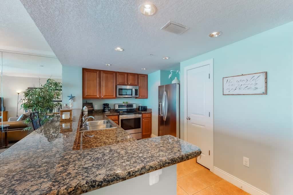 Gulf-facing condo with pool, scenic balcony, beach service & beach access
