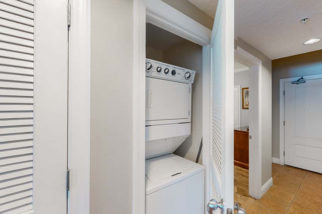 Gulf-facing condo with pool, scenic balcony, beach service & beach access
