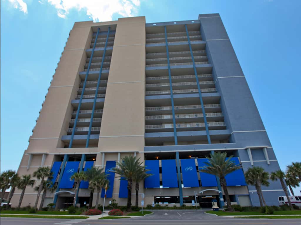 Gulf-facing condo with pool, scenic balcony, beach service & beach access