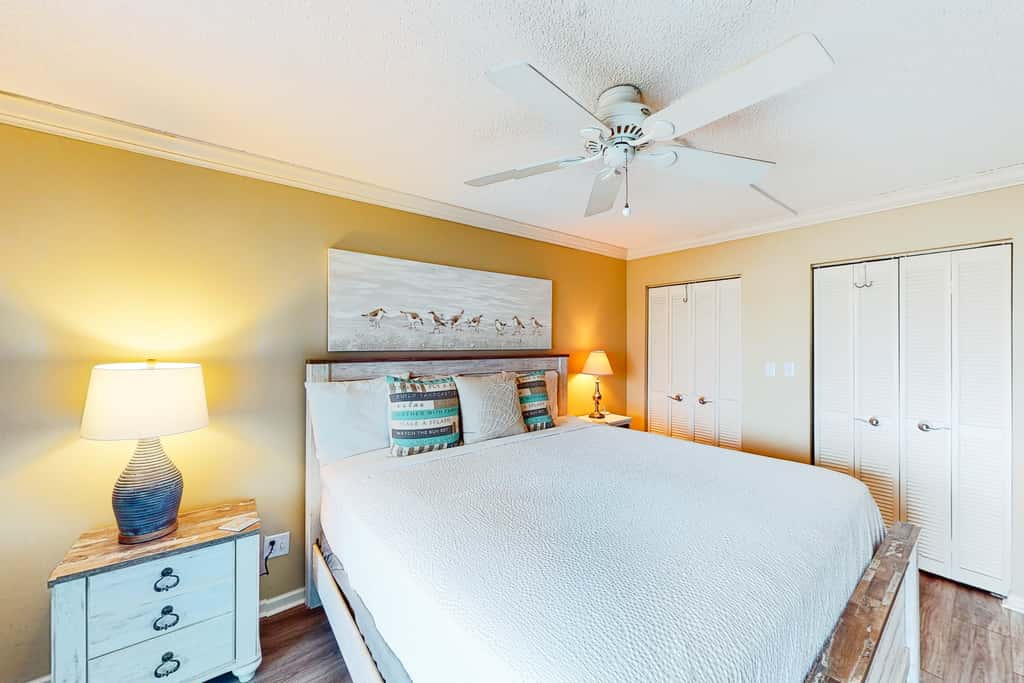 Beachfront condo with ocean-view balcony, pools, hot tub, gym, central AC, & WD