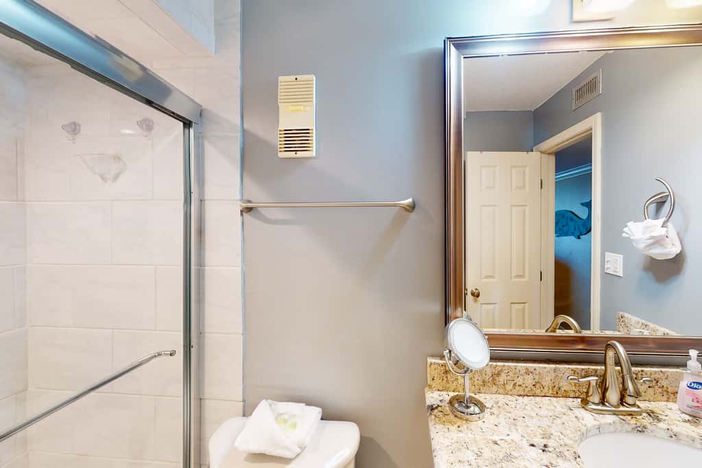 Beachfront condo with ocean-view balcony, pools, hot tub, gym, central AC, & WD