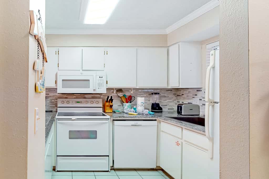 Dog-friendly resort condo with pools, hot tub, tennis, basketball, fitness room