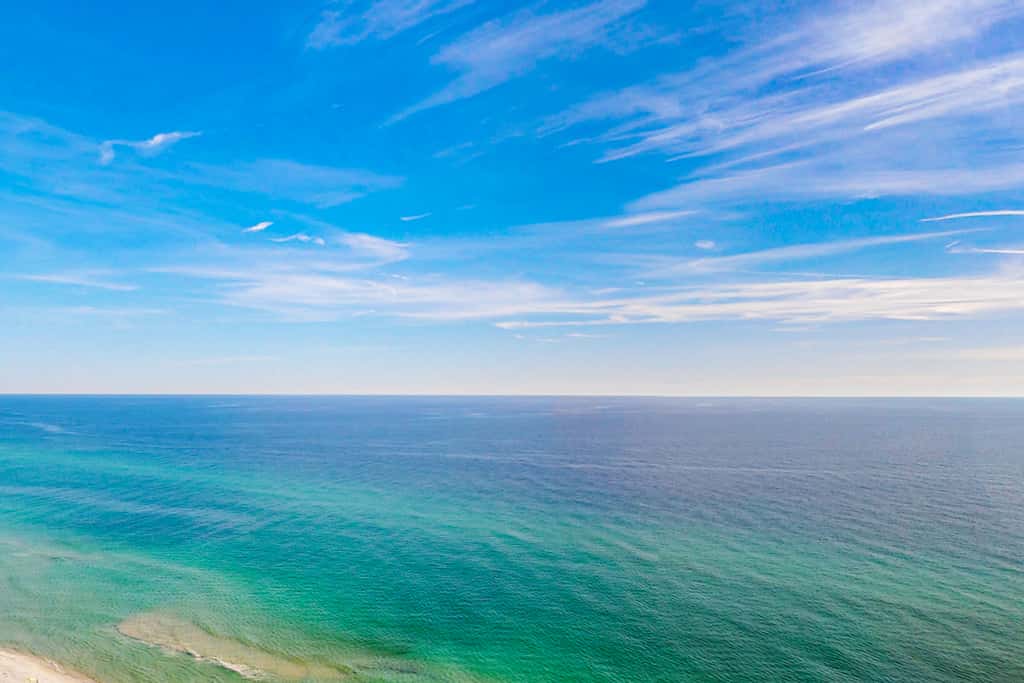 Modern, Gulf-front condo with pool, hot tub & high-speed WiFi