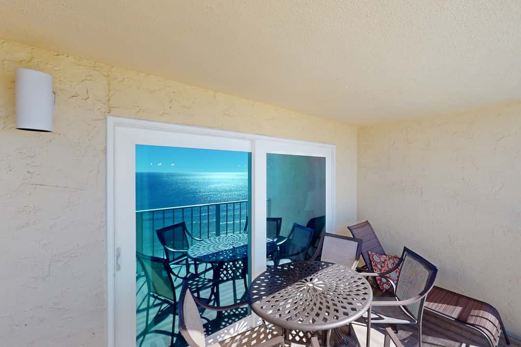 Stunning beachfront condo w/ beach access, shared pool, & private balcony