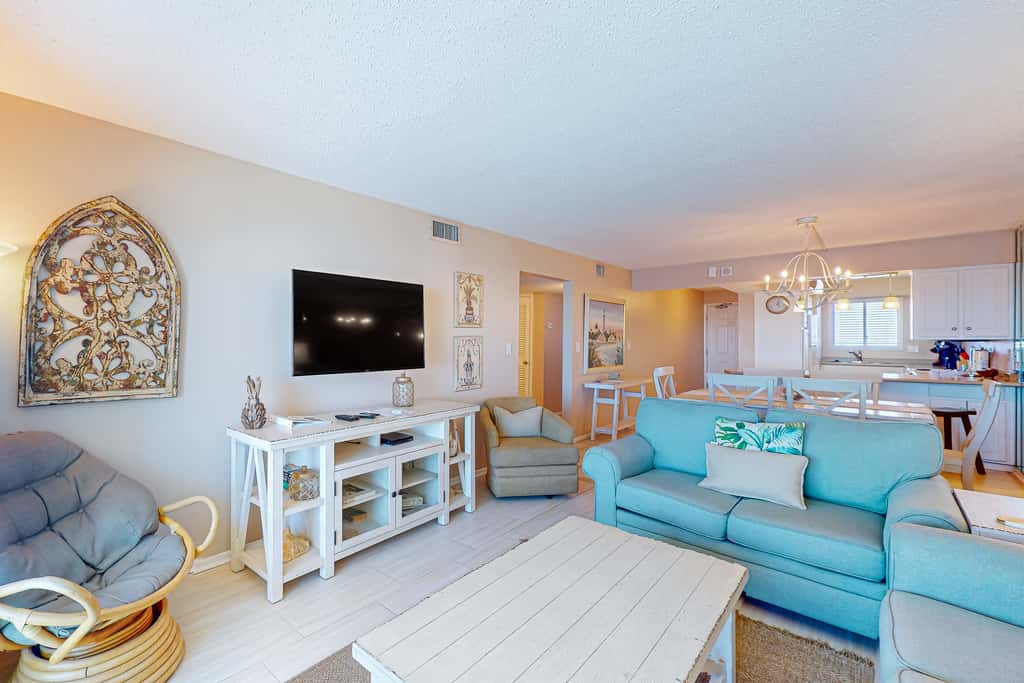 Stunning beachfront condo w/ beach access, shared pool, & private balcony