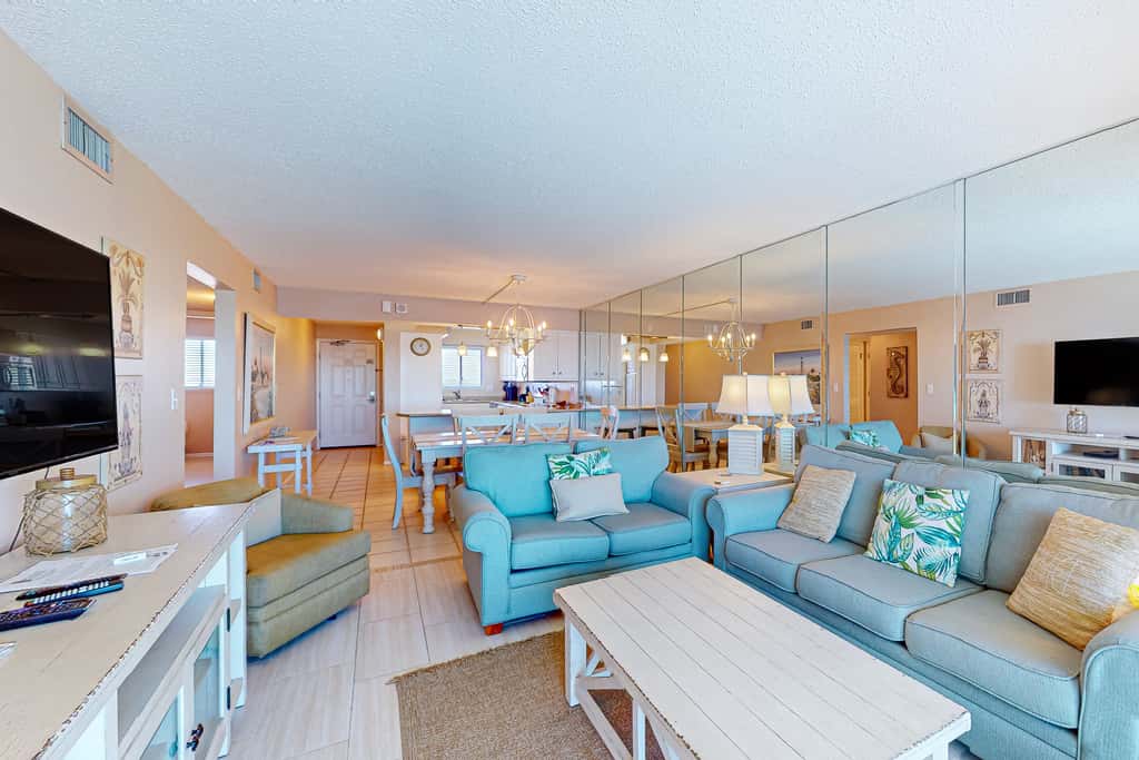 Stunning beachfront condo w/ beach access, shared pool, & private balcony