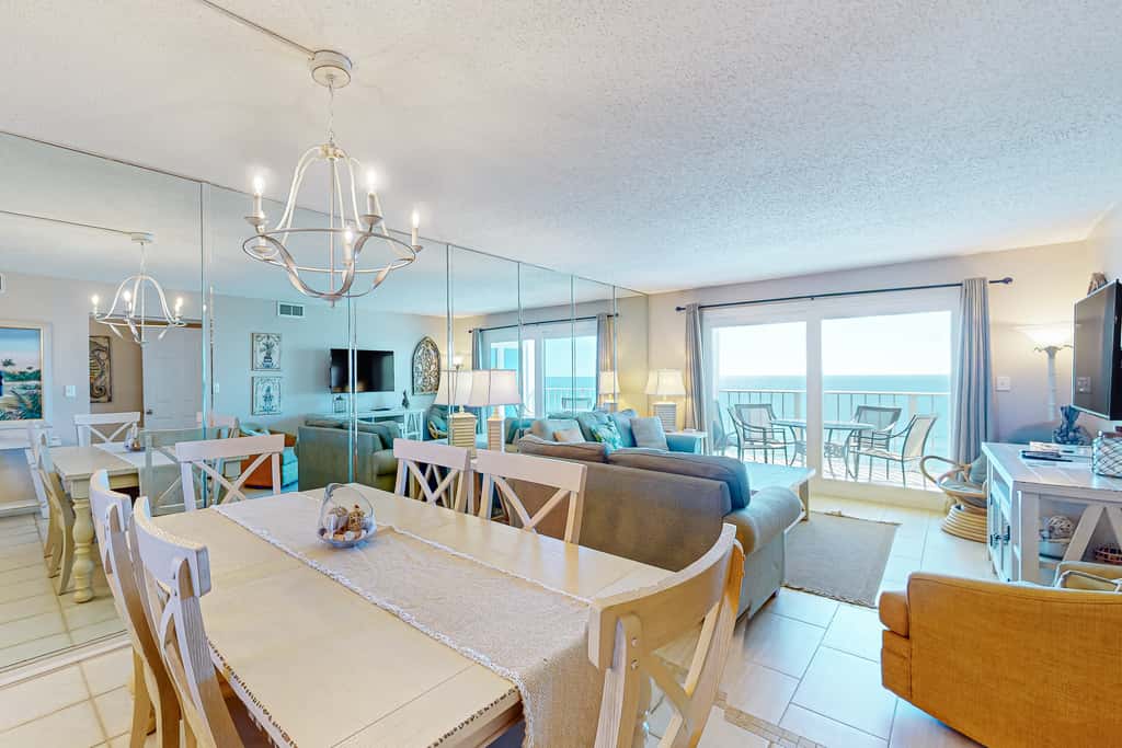 Stunning beachfront condo w/ beach access, shared pool, & private balcony