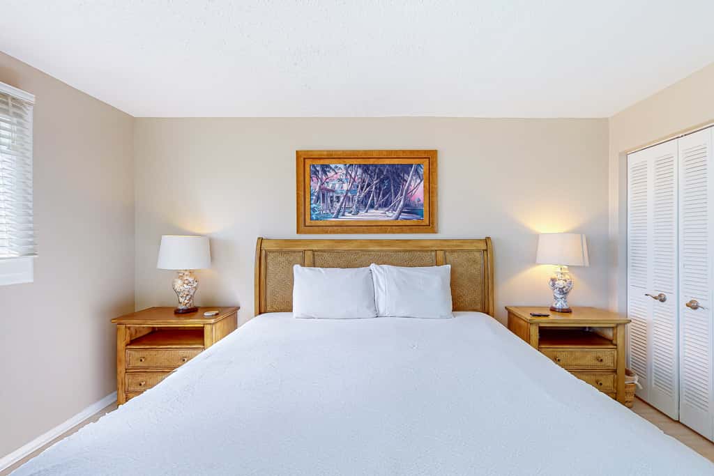 Stunning beachfront condo w/ beach access, shared pool, & private balcony