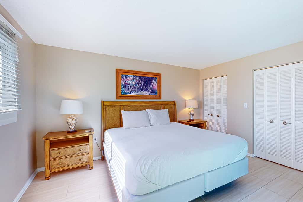 Stunning beachfront condo w/ beach access, shared pool, & private balcony