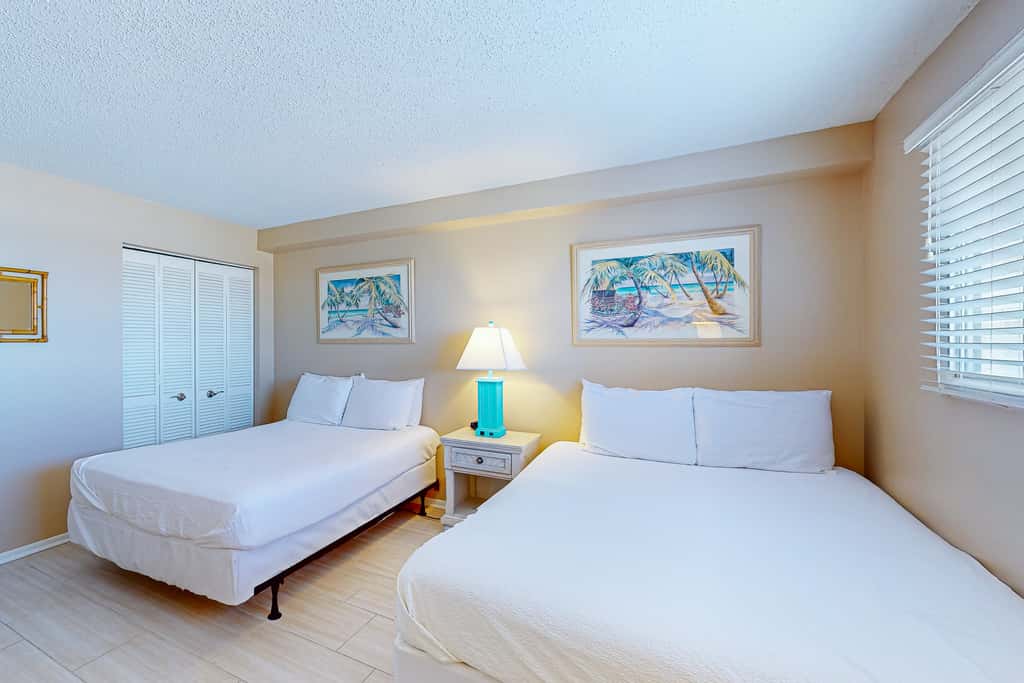 Stunning beachfront condo w/ beach access, shared pool, & private balcony
