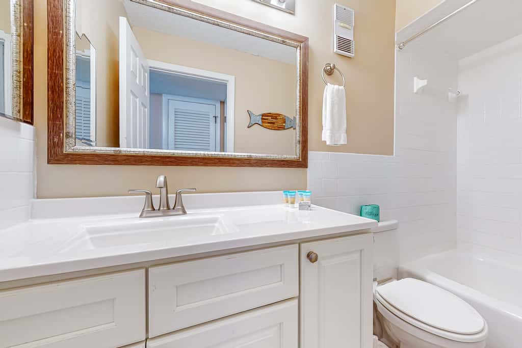 Stunning beachfront condo w/ beach access, shared pool, & private balcony