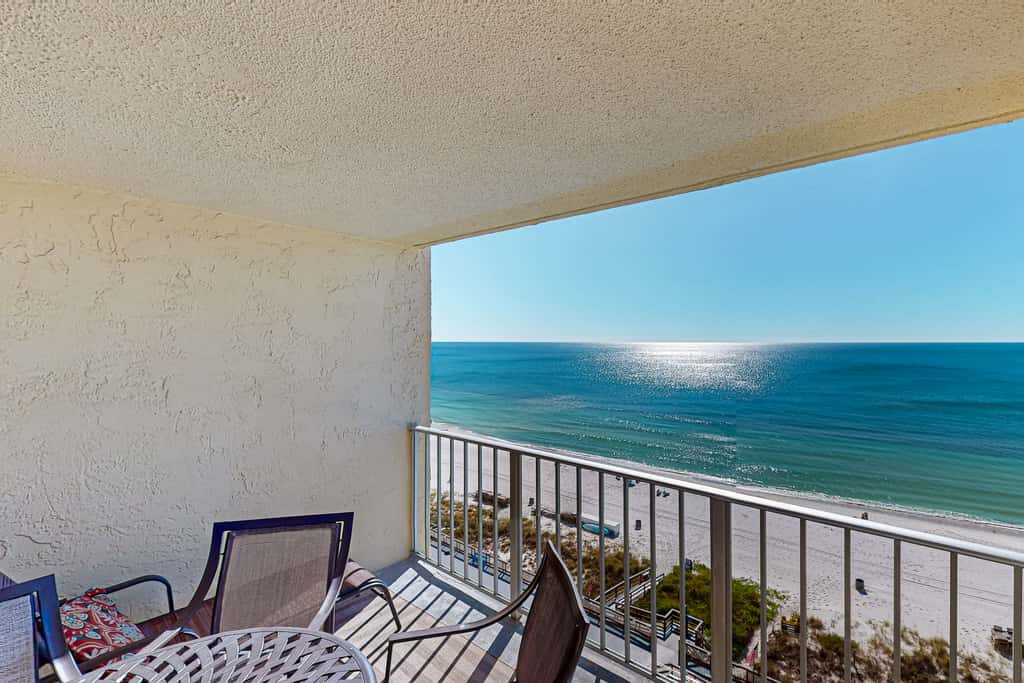 Stunning beachfront condo w/ beach access, shared pool, & private balcony