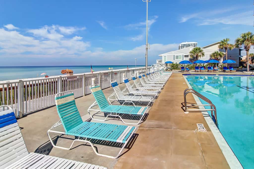 Stunning beachfront condo w/ beach access, shared pool, & private balcony