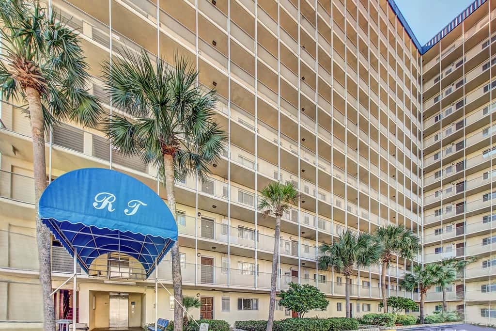 Stunning beachfront condo w/ beach access, shared pool, & private balcony