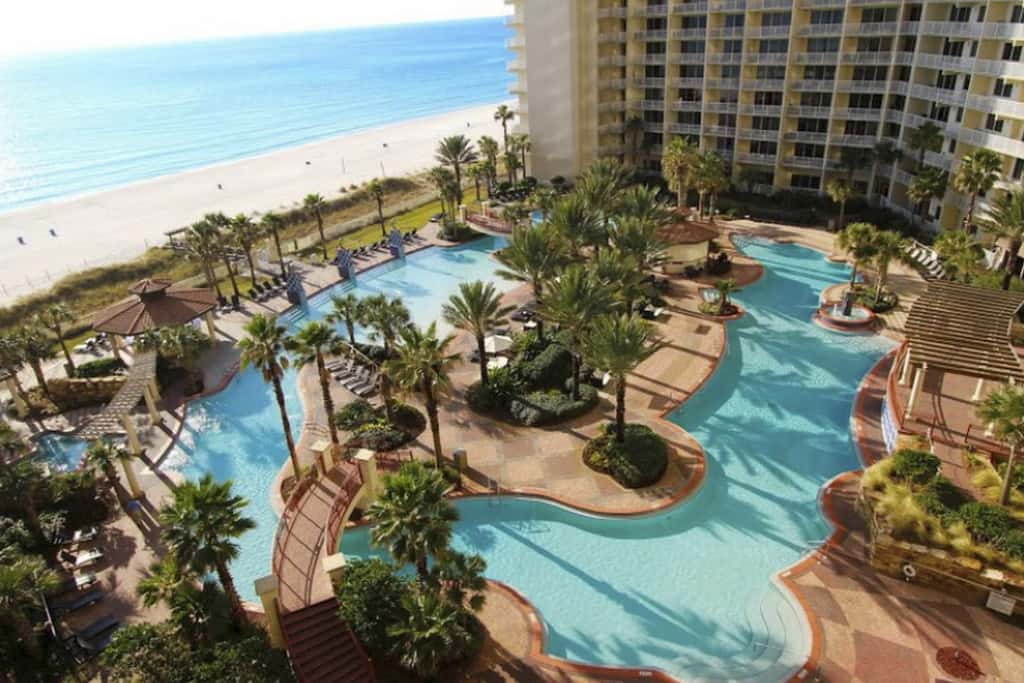 Luxury penthouse suite with Gulf-view wraparound balcony, pools, hot tubs & AC