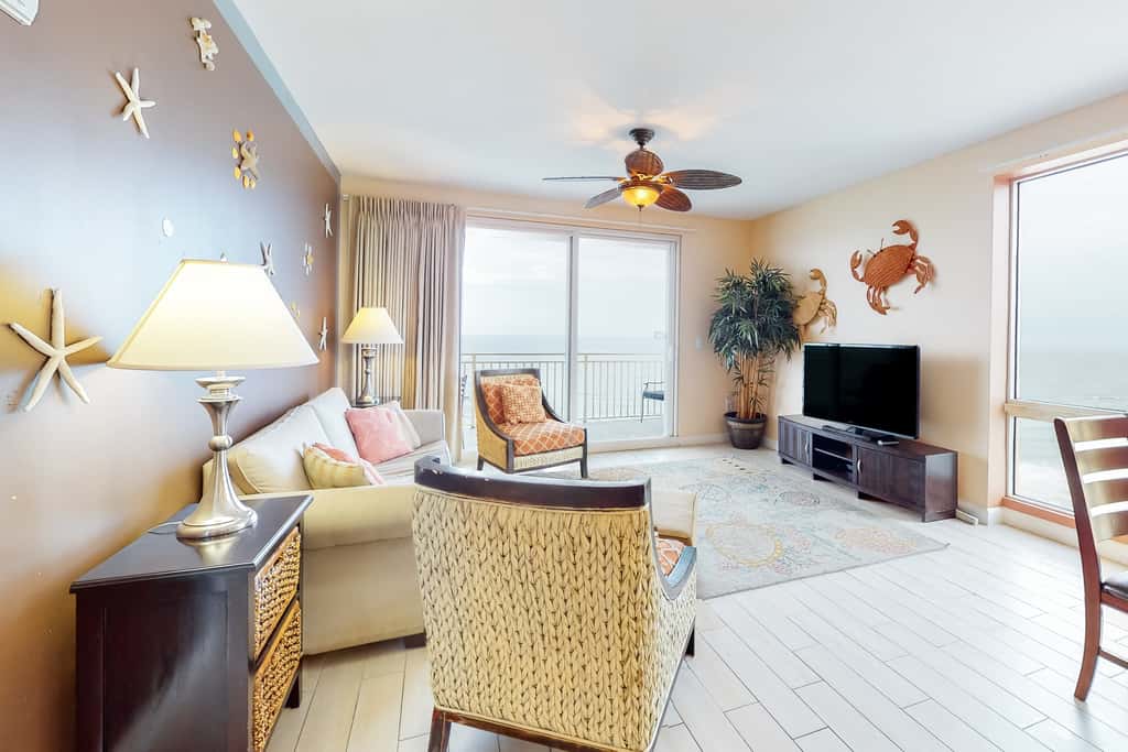 Superb beach living at lovely waterfront condo with pools, a gym, & hot tub