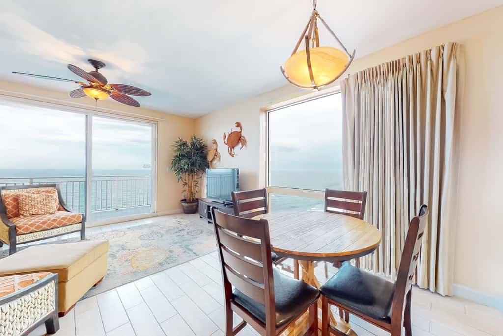 Superb beach living at lovely waterfront condo with pools, a gym, & hot tub