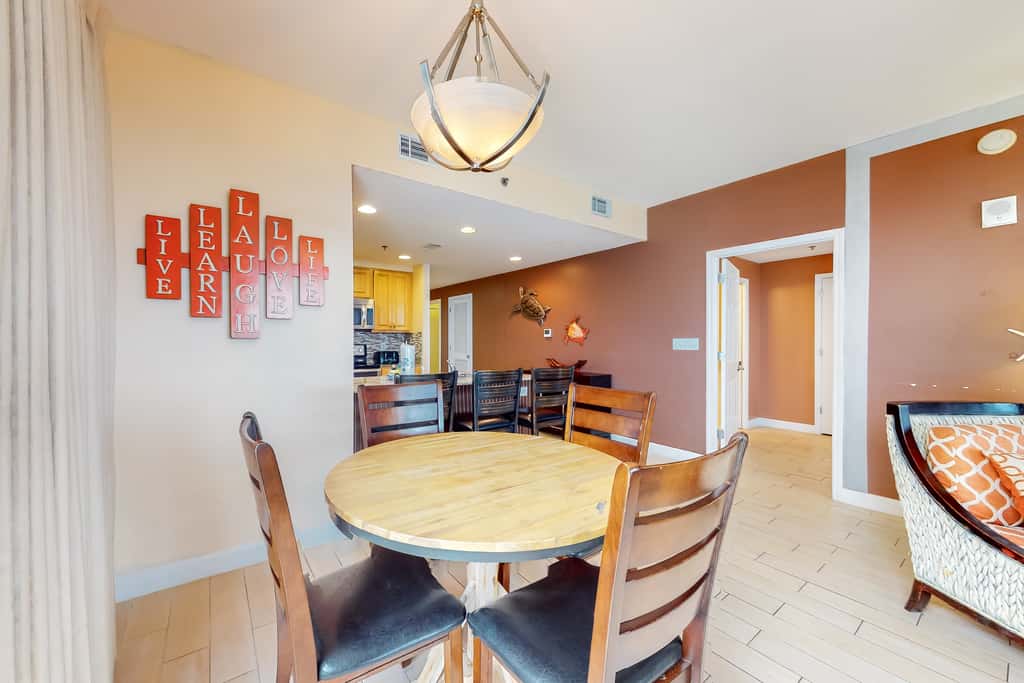 Superb beach living at lovely waterfront condo with pools, a gym, & hot tub