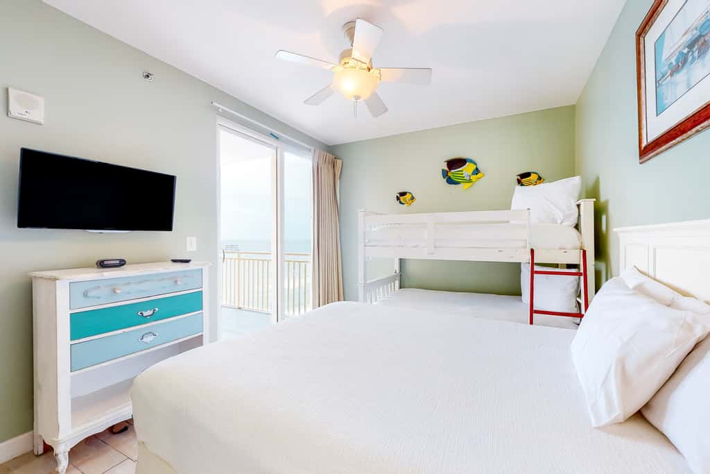 Superb beach living at lovely waterfront condo with pools, a gym, & hot tub