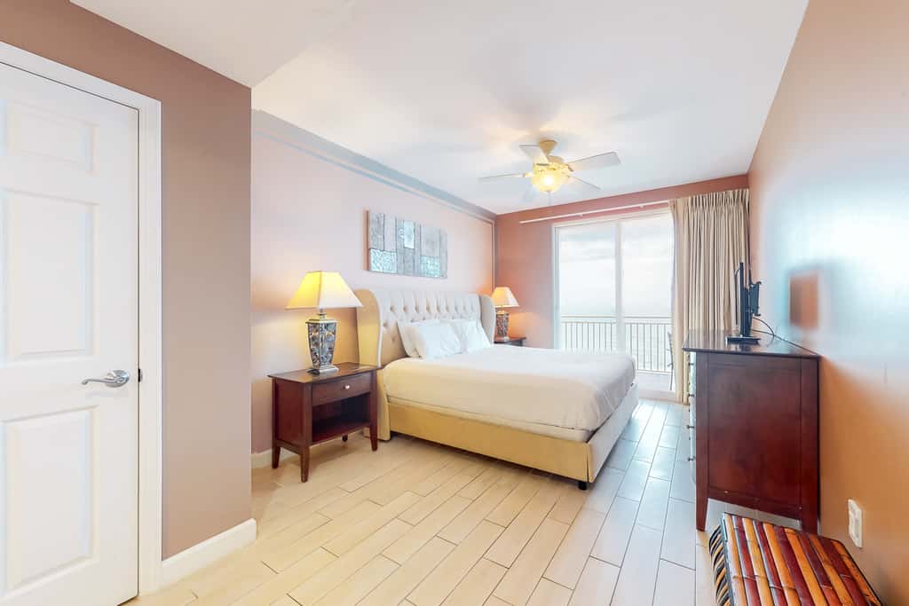 Superb beach living at lovely waterfront condo with pools, a gym, & hot tub