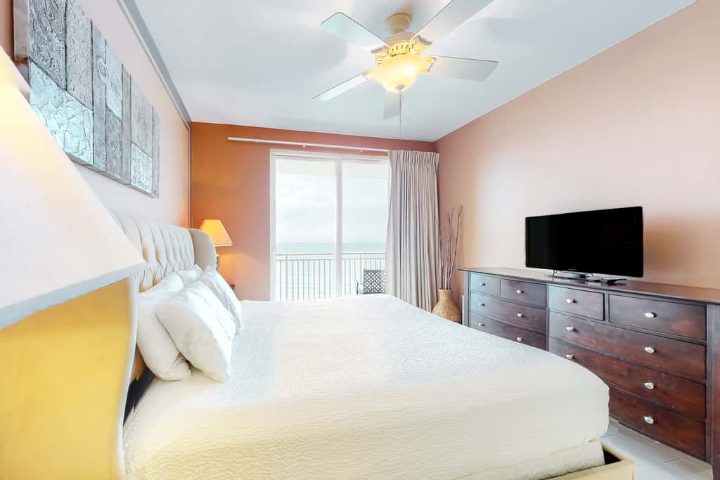 Superb beach living at lovely waterfront condo with pools, a gym, & hot tub