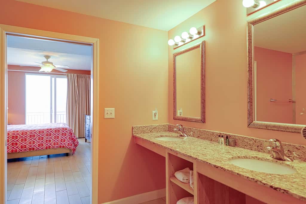 Superb beach living at lovely waterfront condo with pools, a gym, & hot tub