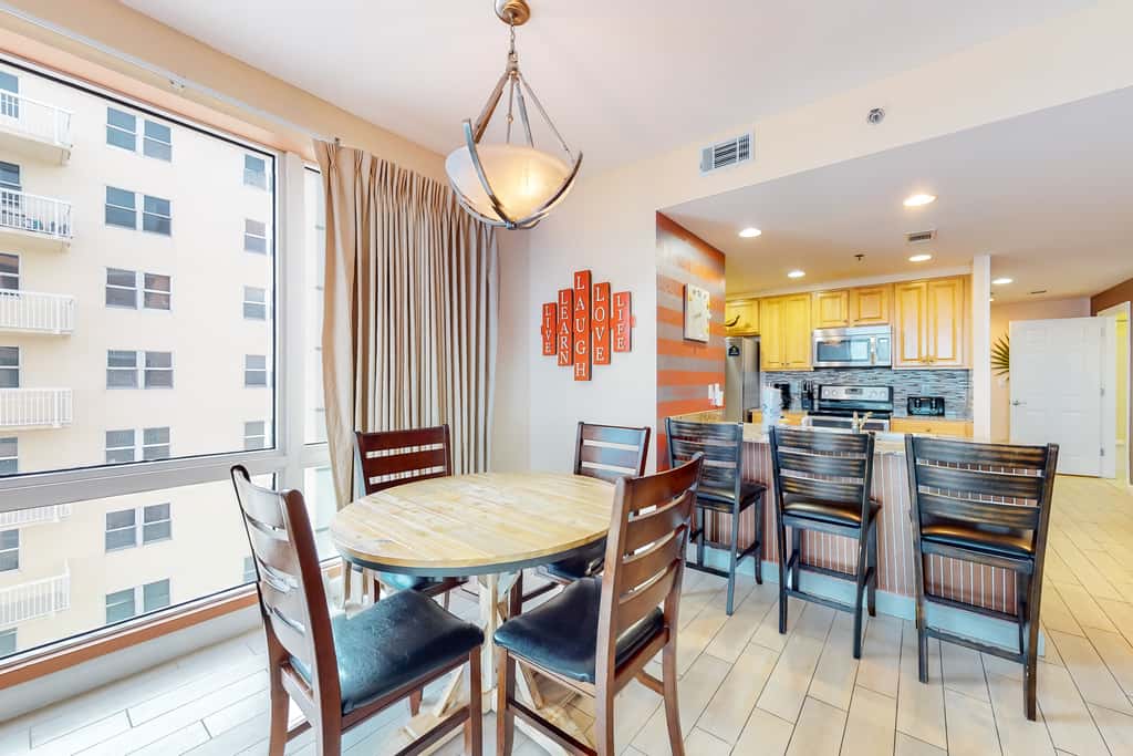 Superb beach living at lovely waterfront condo with pools, a gym, & hot tub