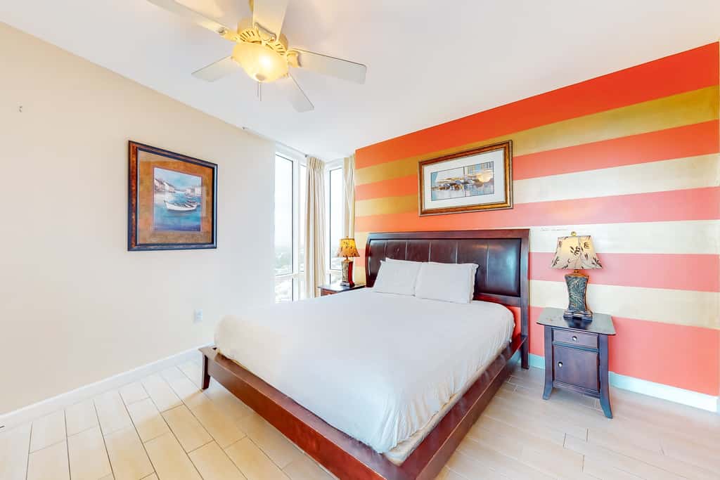 Superb beach living at lovely waterfront condo with pools, a gym, & hot tub