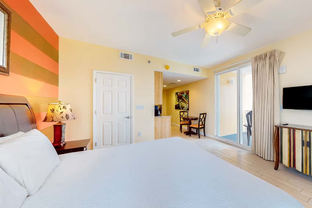 Superb beach living at lovely waterfront condo with pools, a gym, & hot tub
