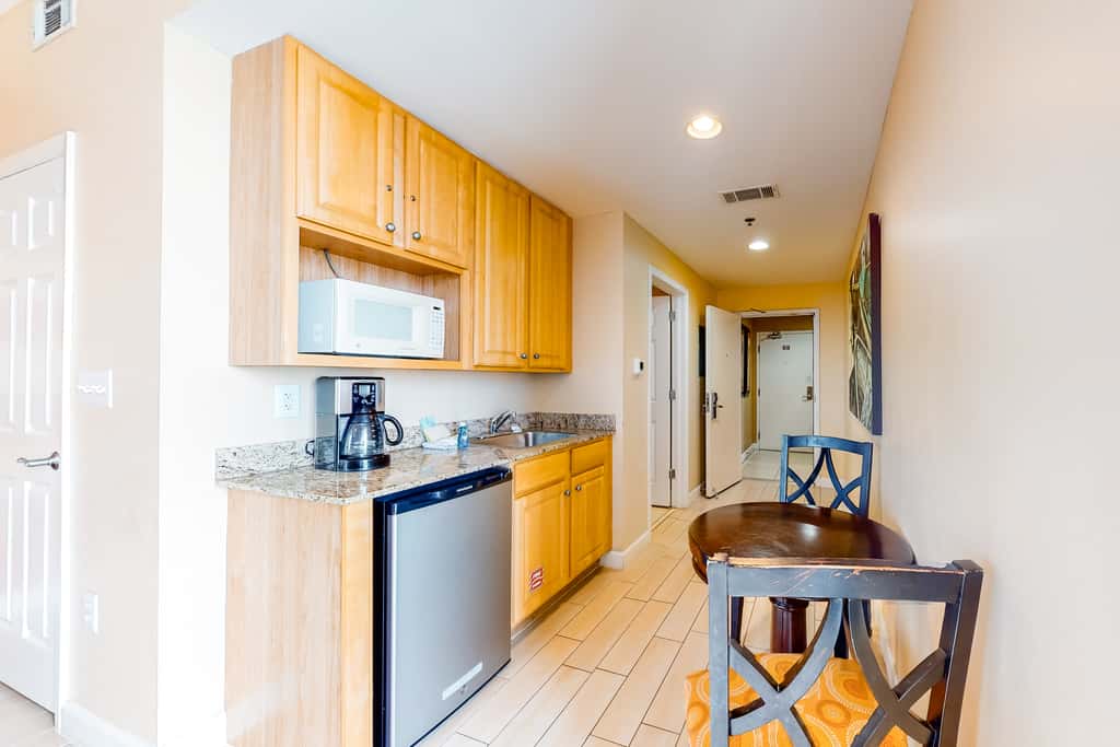 Superb beach living at lovely waterfront condo with pools, a gym, & hot tub