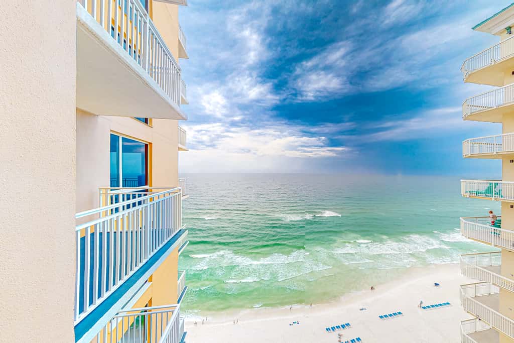 Superb beach living at lovely waterfront condo with pools, a gym, & hot tub