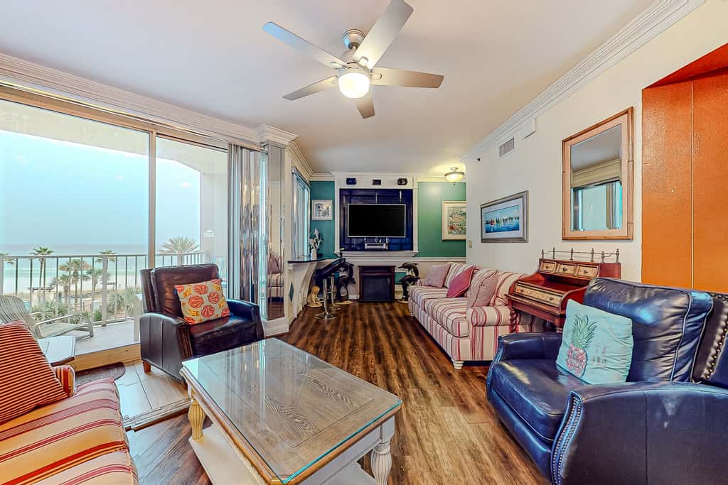 Gulf-front condo with sweeping views, pools, hot tubs, & easy beach