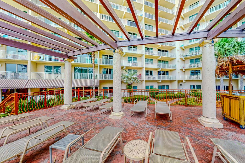 Gulf-front condo with sweeping views, pools, hot tubs, & easy beach