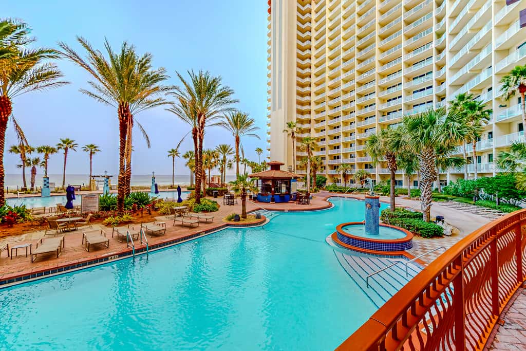 Gulf-front condo with sweeping views, pools, hot tubs, & easy beach
