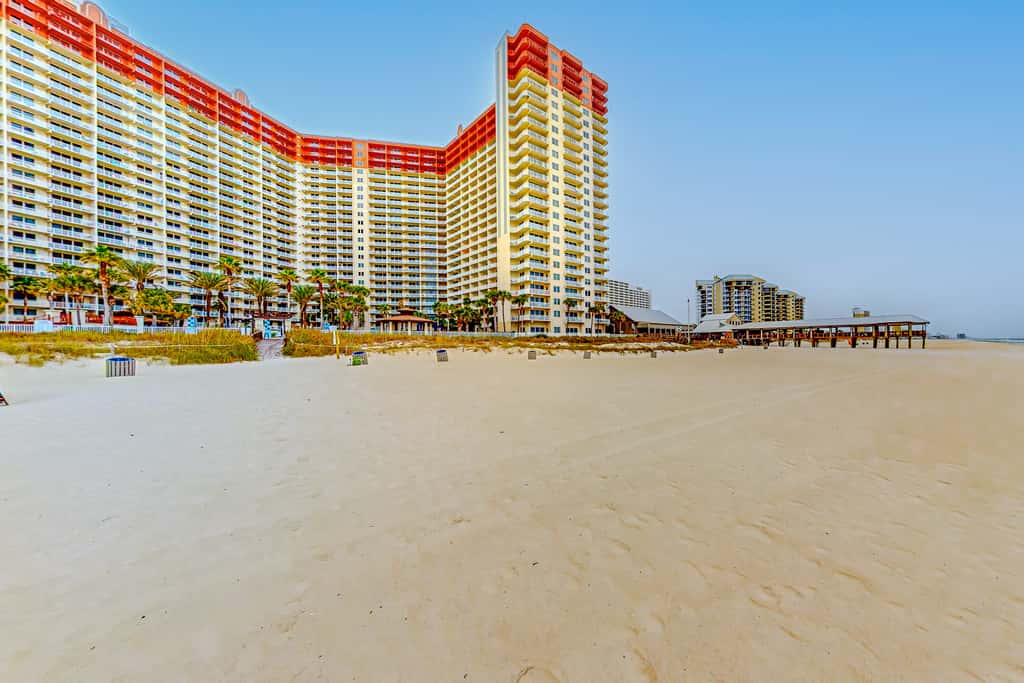 Gulf-front condo with sweeping views, pools, hot tubs, & easy beach