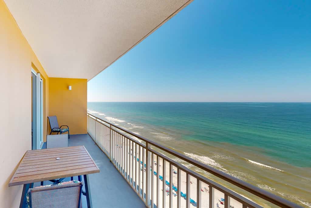 Gulf-front condo with pool, hot tub, balcony, & complimentary beach service