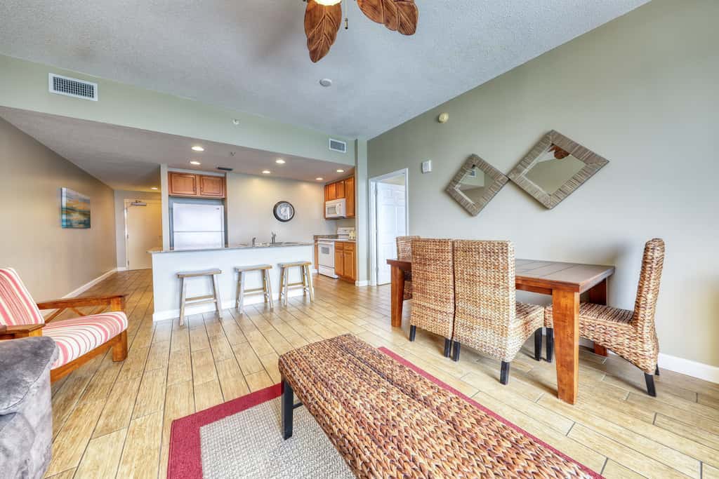 Waterfront condo with furnished balcony, pool, gym & beach