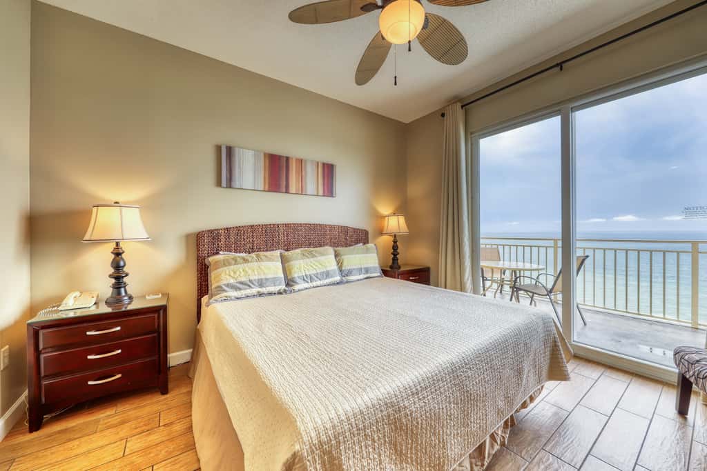 Waterfront condo with furnished balcony, pool, gym & beach