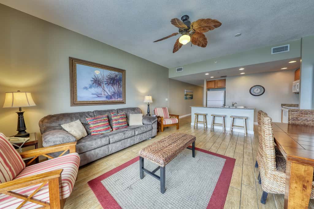 Waterfront condo with furnished balcony, pool, gym & beach