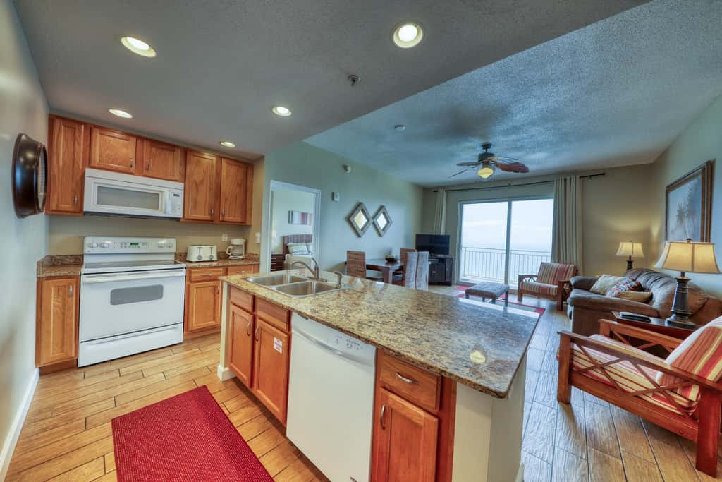 Waterfront condo with furnished balcony, pool, gym & beach