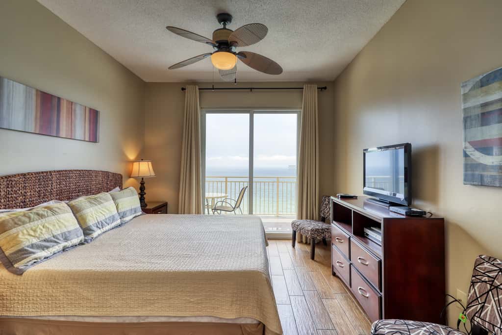 Waterfront condo with furnished balcony, pool, gym & beach