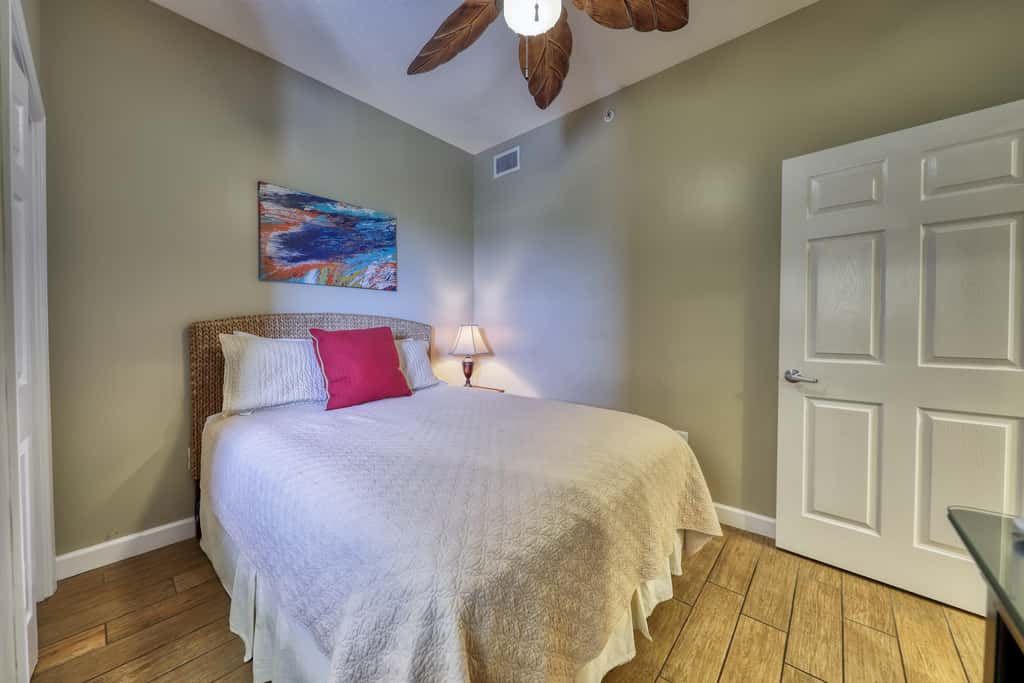 Waterfront condo with furnished balcony, pool, gym & beach