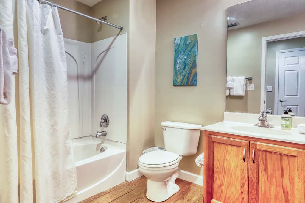 Waterfront condo with furnished balcony, pool, gym & beach