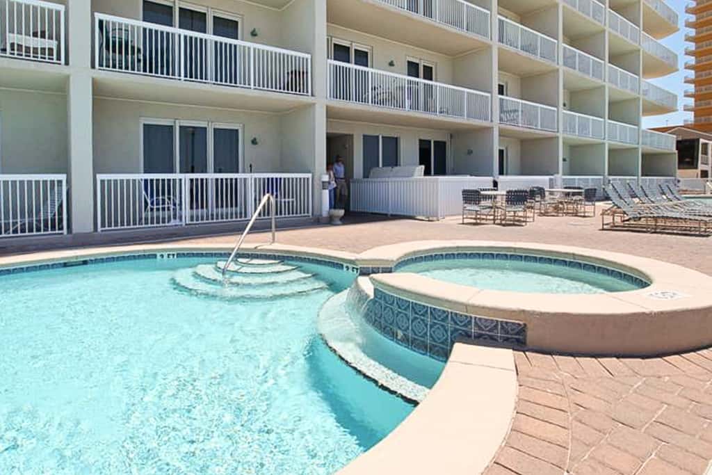 Spacious retreat in Panama City with beach access, sundeck, & pool, hot tub